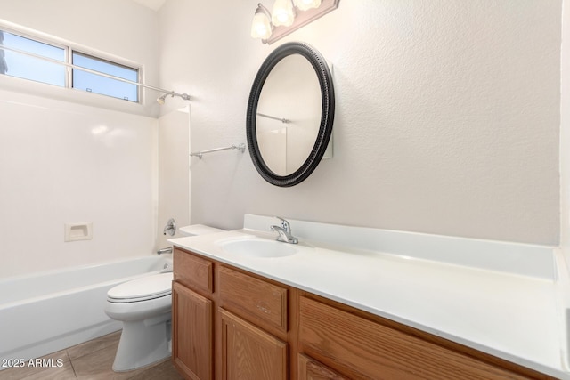 full bathroom with tile patterned floors, toilet, shower / bath combination, and vanity