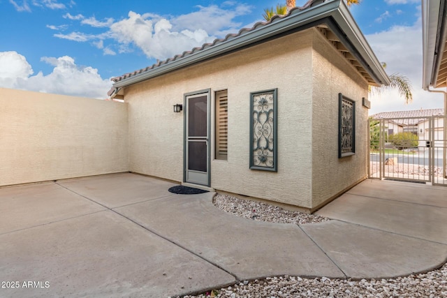 exterior space with a pergola and a patio