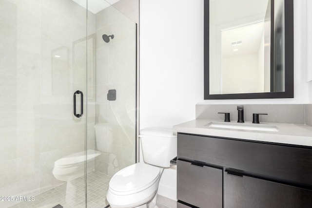 full bathroom with toilet, a shower stall, and vanity