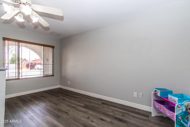2338 E Javelina Ave, Mesa, AZ 85204 - unfurnished room with dark wood finished floors and a ceiling fan