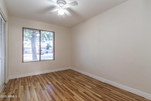 2338 E Javelina Ave, Mesa, AZ 85204 - empty room with light wood-style floors and ceiling fan