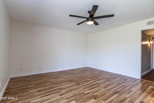 2338 E Javelina Ave, Mesa, AZ 85204 - spare room with ceiling fan and wood finished floors