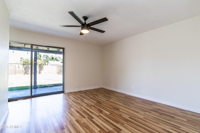 2338 E Javelina Ave, Mesa, AZ 85204 - empty room with wood finished floors and a ceiling fan
