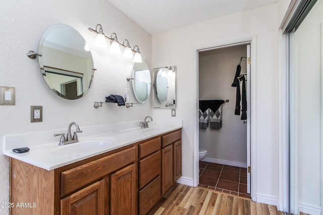 2338 E Javelina Ave, Mesa, AZ 85204 - bathroom with double vanity and wood finished floors