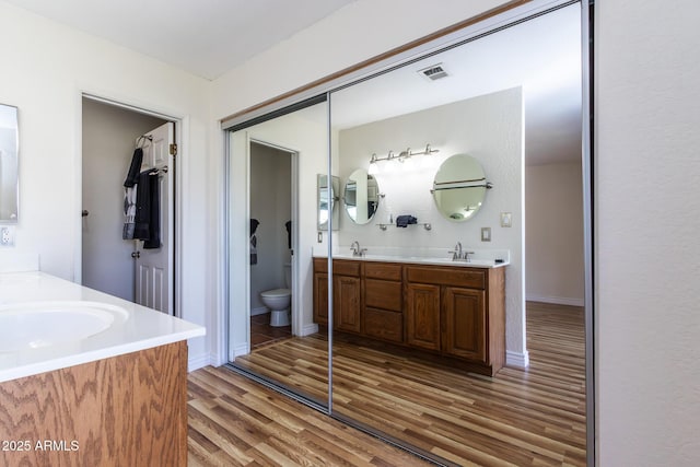 2338 E Javelina Ave, Mesa, AZ 85204 - full bath with double vanity and wood finished floors