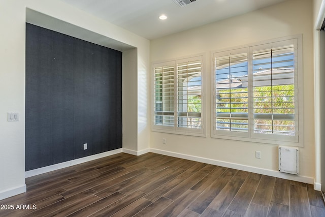 70 E Kennedia Dr, Queen Creek, AZ 85140 - empty room featuring dark wood-style floors, plenty of natural light, baseboards, and recessed lighting