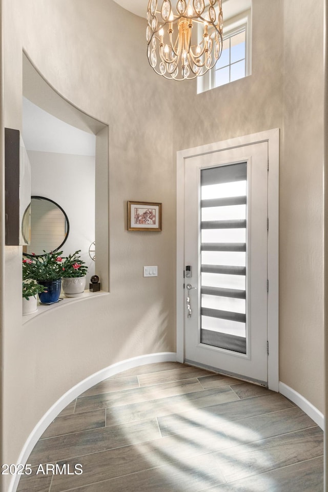70 E Kennedia Dr, Queen Creek, AZ 85140 - foyer with wood finished floors, baseboards, and a chandelier