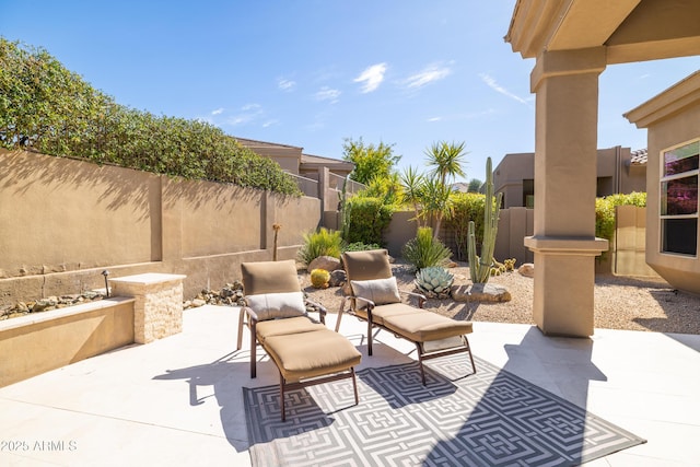 view of patio / terrace with fence