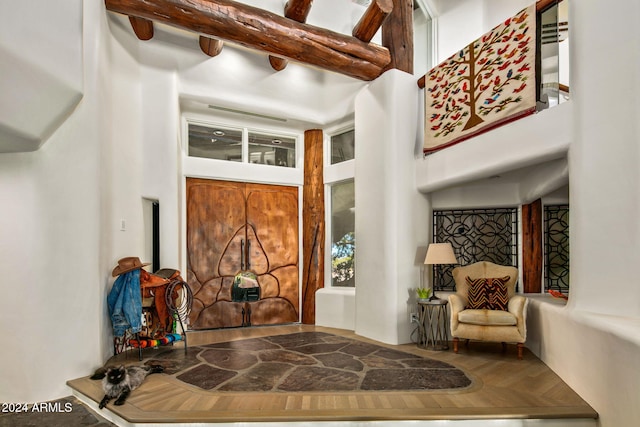 entryway with a high ceiling