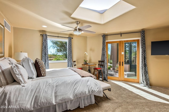 carpeted bedroom featuring access to outside, french doors, and ceiling fan