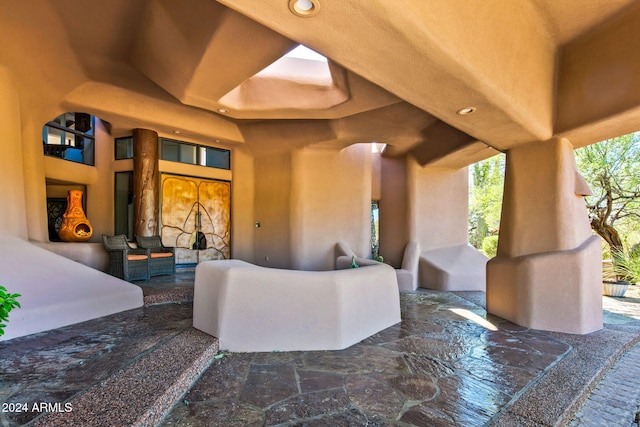 view of patio / terrace with an outdoor fireplace