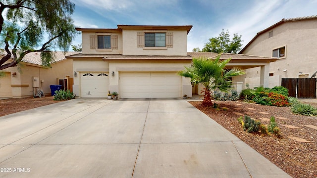 10441 W Windsor Ave, Avondale, AZ 85392 - traditional-style house with an attached garage, stucco siding, and concrete driveway