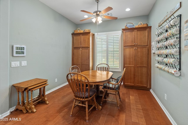 20506 N 271st Ave, Buckeye, AZ 85396 - dining space with baseboards, a ceiling fan, wood finished floors, and recessed lighting