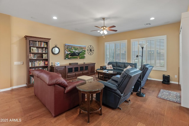 20506 N 271st Ave, Buckeye, AZ 85396 - living area with recessed lighting, ceiling fan, visible vents, and wood finished floors