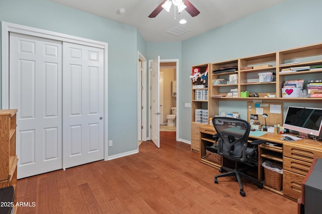 20506 N 271st Ave, Buckeye, AZ 85396 - home office featuring baseboards, ceiling fan, light wood-type flooring, and visible vents
