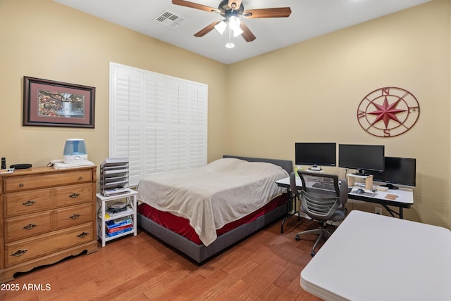 20506 N 271st Ave, Buckeye, AZ 85396 - bedroom with ceiling fan, visible vents, and light wood-style floors