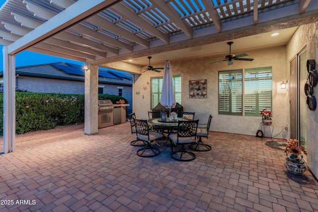 20506 N 271st Ave, Buckeye, AZ 85396 - view of patio featuring grilling area, ceiling fan, an outdoor kitchen, outdoor dining space, and a pergola