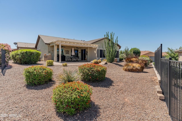 20506 N 271st Ave, Buckeye, AZ 85396 - back of property with stucco siding, ceiling fan, fence, and a patio