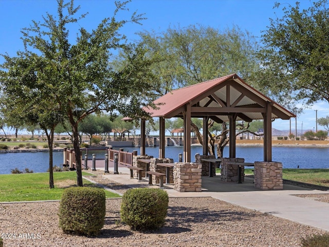 view of home's community featuring a gazebo and a water view