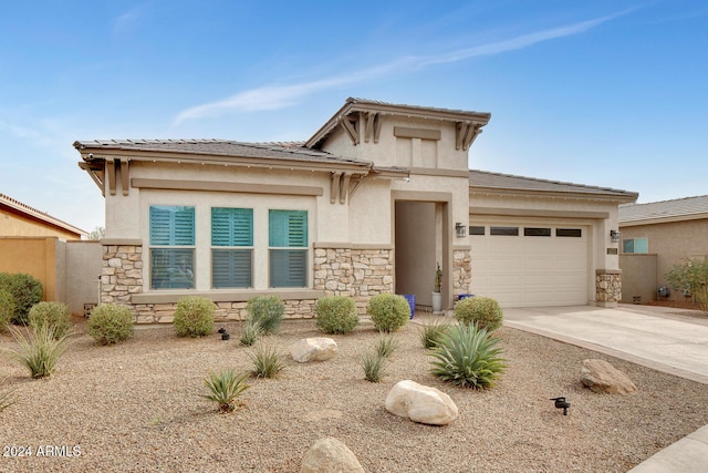 prairie-style house featuring a garage