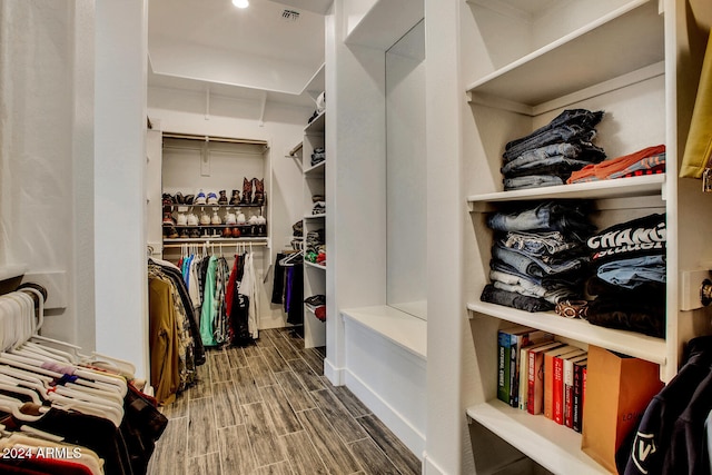 spacious closet with wood-type flooring