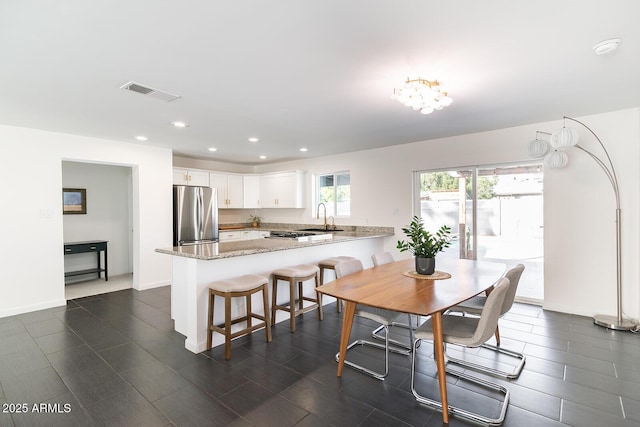 dining space with sink