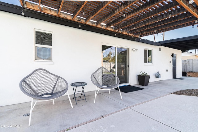 view of patio featuring a pergola