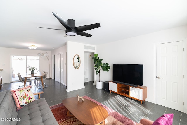 living room featuring ceiling fan