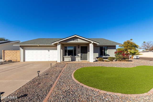 single story home featuring a garage and a front yard