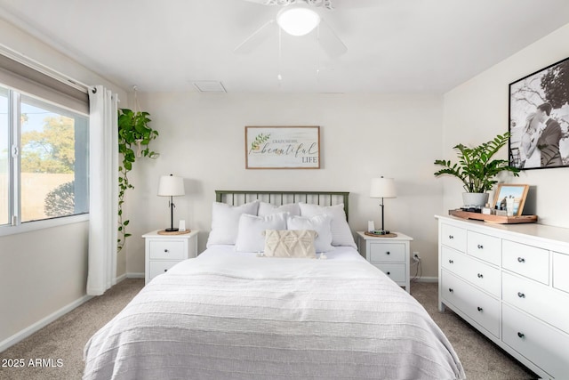 bedroom featuring ceiling fan and carpet