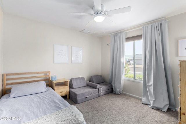 bedroom with ceiling fan and carpet flooring