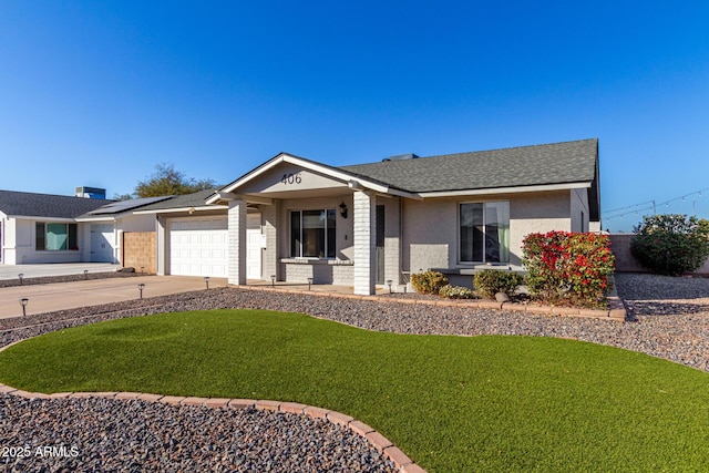 single story home with a garage and a front lawn