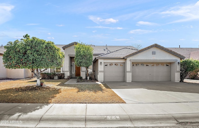 view of front of property with a garage