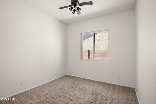 unfurnished room with carpet floors and ceiling fan