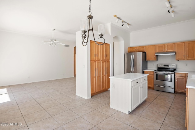 kitchen featuring hanging light fixtures, track lighting, appliances with stainless steel finishes, a kitchen island, and ceiling fan