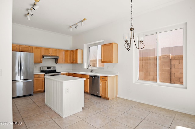 kitchen with decorative light fixtures, sink, a center island, light tile patterned floors, and stainless steel appliances