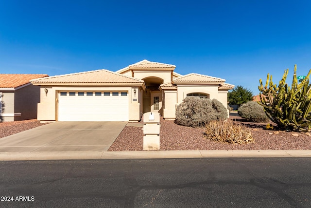 view of front of home with a garage