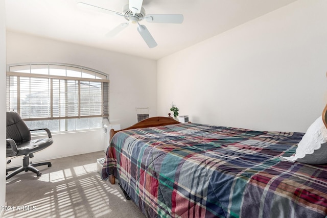 bedroom with ceiling fan and carpet floors