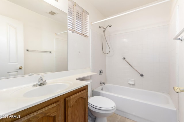 full bathroom featuring tile patterned floors, vanity, toilet, and tiled shower / bath