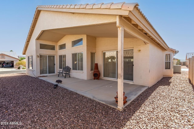 rear view of property with a patio area