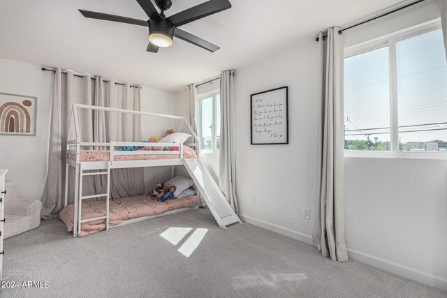 bedroom with ceiling fan and carpet