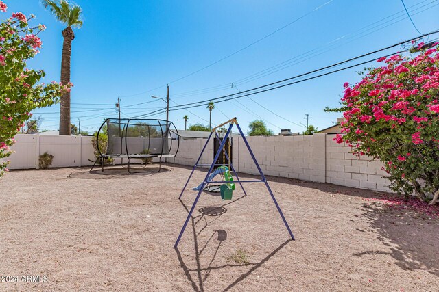 view of play area featuring a trampoline