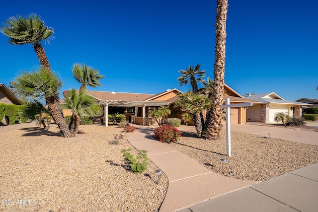 single story home featuring a garage