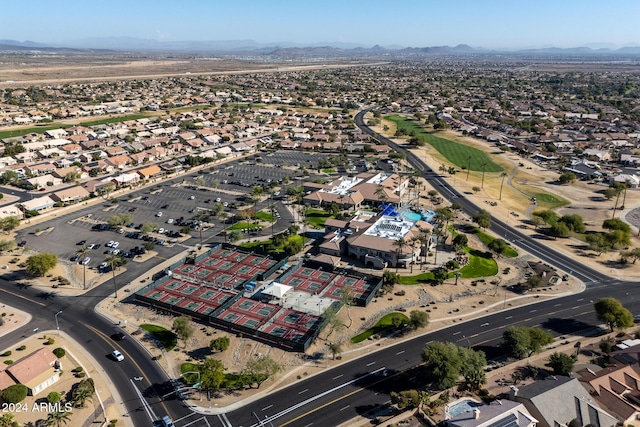 birds eye view of property with a mountain view