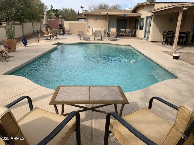 view of pool with a patio