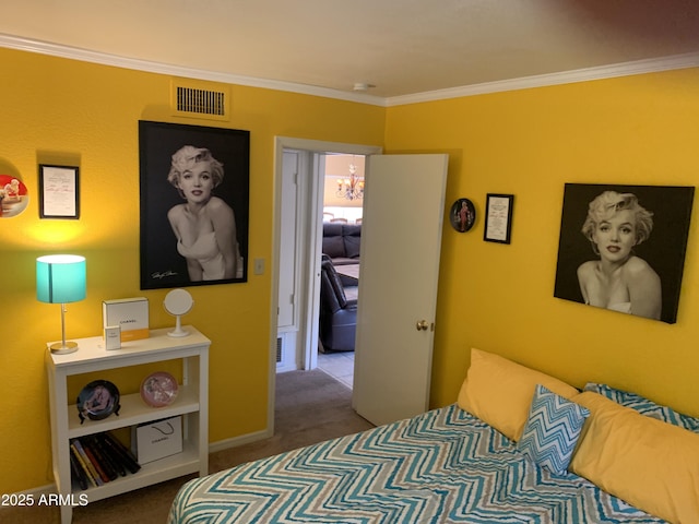 bedroom with crown molding and carpet