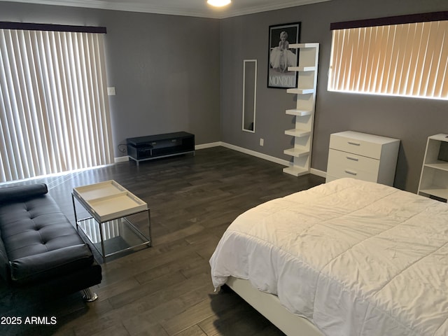 bedroom featuring dark wood-type flooring and ornamental molding