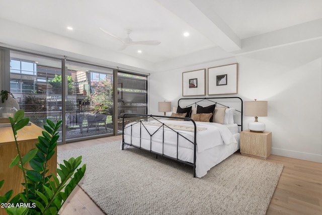 bedroom with ceiling fan, access to outside, light hardwood / wood-style flooring, and beam ceiling