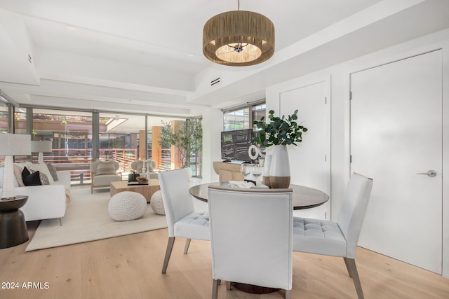 dining space featuring light hardwood / wood-style flooring