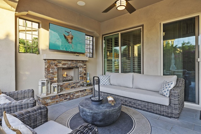 3770 E Ringtail Way, Phoenix, AZ 85050 - view of patio / terrace featuring an outdoor living space with a fireplace and a ceiling fan
